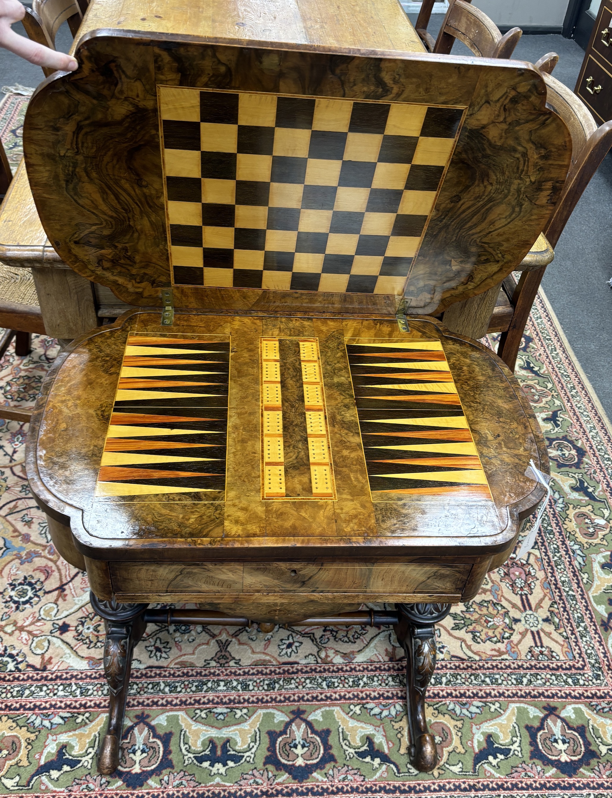 A Victorian inlaid burr walnut games / work table, width 70cm, depth 46cm, height 69cm